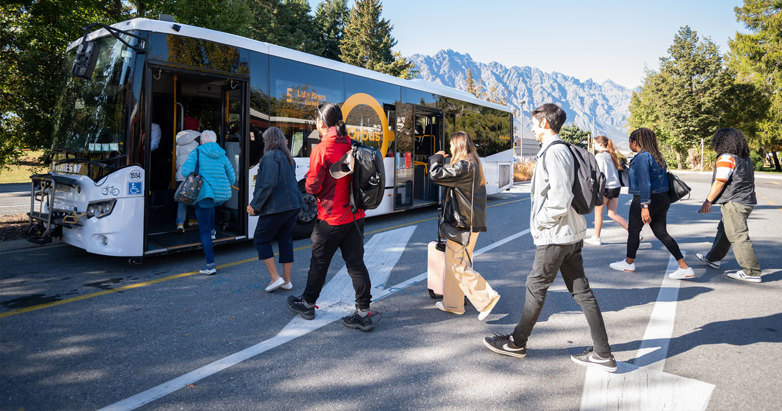 Passengers in Queenstown boarding a bus