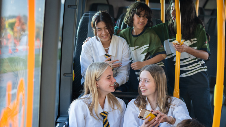 School students on a bus.