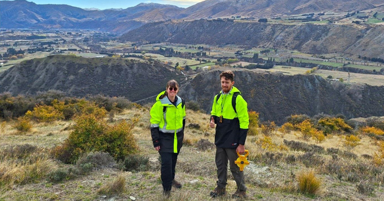 Natural Hazards Analysts Jen and Julion on a site visit at a landslide on the Kawarau River near Gibbston