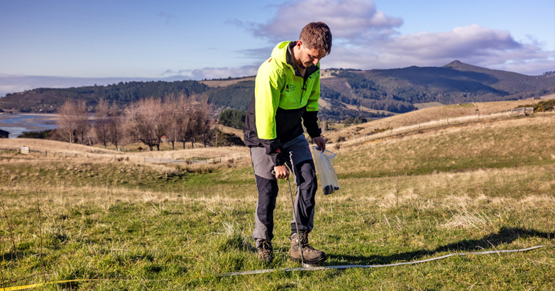 Land and soil scientist Erik conducting some soil sampling